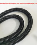 Close-up of a heavy duty hand planer hose for woodworking dust collection, 4 meter flexible black tube.