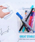 Clear Pegboard Cup Set 6 Pack With Hooks For Garage Workshop Craft Room Office and Home Organization Square Cup Holders That Fit One Eighth Inch Pegboard Super Handy Easy To See Contents displaying pens and tools