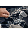 Mechanic using 7 Piece SAE Ratcheting Wrench Set With 72 Tooth Box End 15 Degree Offset Chrome Finish Quick Engagement in tight engine space