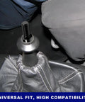 Upgrade Your Ride With 2 Inch Shifter Extension Lever Made From Durable Aluminum Alloy Fits M10x1.5 Threads For Smooth Gear Changes On Any 5 Or 6 Speed Manual Car Transmission Perfect For Daily Cruising And Track Days, close-up of black shift knob extender installed.