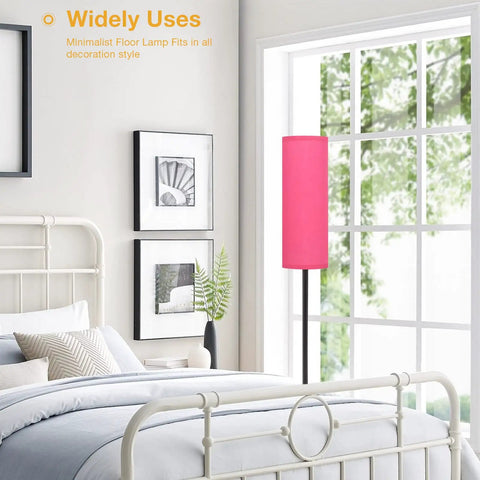 Pink Shade Floor Lamp For Living Room And Bedroom, Tall 65 Inch Standing Lamp With Black Iron Pole next to a bed