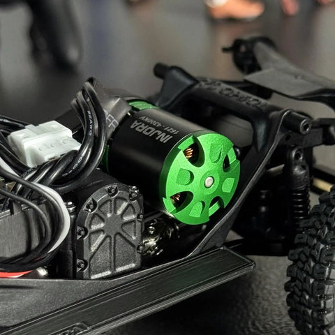 4300KV Green Viper 1621 RC Brushless Motor For 1/30 Scale Axial SCX30 Upgrade installed in crawler, close-up view