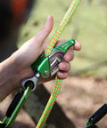 Using Rope Grab With Three Friction Settings And One Hand Operation For 11 To 13mm Lines outdoors with safety gear.