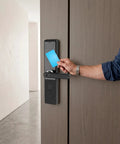 User accessing Slick Smart Fingerprint Door Lock And Keyless Entry Deadbolt Handle with blue card, heavy duty aluminum alloy design.