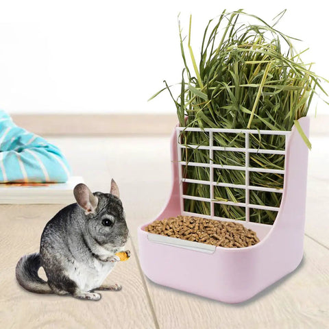 Super Cool Pink Two In One Rabbit Hay Feeder With Automatic Guinea Pig Food Bowl And Quick Release Grass Rack with hay and a chinchilla.