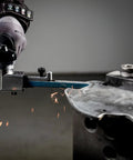 Killer 18V Cordless Belt File With Brushless Motor And Variable Speed Control for precise metalwork, grinding sparks visible.