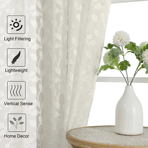 Ivory Sheer Curtains Two Panel Set For Bedroom Or Living Room, Light Filtering Soft Tufted Texture, close-up of leaf pattern.
