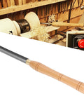 Wood lathe turning chisel with beach handle and steel blade, angled view