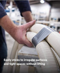 Heavy Duty Duct Tape, Silver, 1 Pack, used for bundling hoses in an industrial setting, showing its sealing capability.