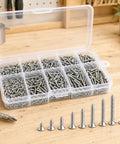 Top Shelf M2 Self Tapping Screws 800 Piece Combo Pack Nickel Plated Carbon Steel in labeled organizer for DIY workshop.