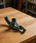 Heavy Duty Manual Pipe Bender For Copper Aluminum Steel Tubes Ergonomic Handle Design With Adjustable Angle Structure Compact Size shown on wooden workbench.