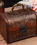 Vintage box with Two Pack Antique Black Hasp Latches With Alloy Swing Arm Clasp for chests, matte black finish, on wooden table.