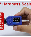 Handheld blue LS252DC Leeb Hardness Tester displaying 7 hardness scales for metal grading uses. Tough As Nails And Ridiculously Lightweight DC Impact Device Leeb Hardness Tester For Metal Grading Fast Shots Confined Area Testing Works Like A Dream Dual Coil Digital Gauge Pro Tool.