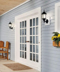 Coastal White Outdoor Wall Light With Clear Beveled Glass 17 Inch Tall 1 Light Exterior Porch Lantern Traditional Lantern Sconce For Curb Appeal And Warm Welcome on blue siding near French doors