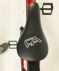 Salire SJ-50 Dirt Jumper Bike With Disc Brakes and 26 Inch Wheels, top view of black saddle and pedals