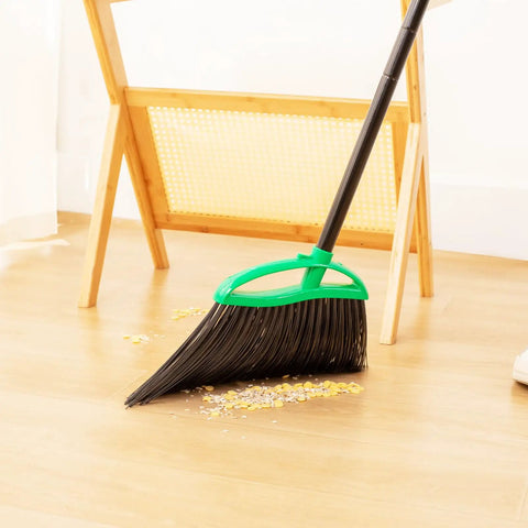 Heckin Tough Heavy Duty Brooms Two Pack With 55 Inch Long Handles Angled Head sweeping debris off wooden floor.
