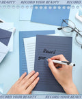 Person writing on All In One Blue Letter Writing Paper And Envelope Set With 50 Lined Papers 50 Envelopes And 50 Stickers sized 5.5 x 8.25 inches