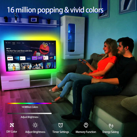 Couple using TV Backlight LED Strip Kit For 32 To 75 Inch TVs in living room, colorful ambient glow enhancing viewing experience.