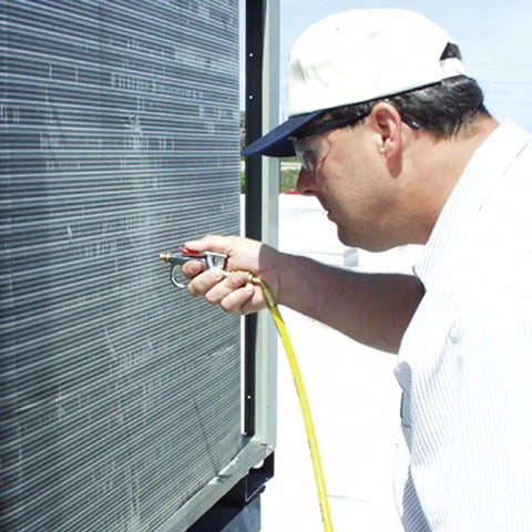 Technician using Nitrogen Sludge Sucker And Blaster Kit With Metal Carrying Stand For 40 Cubic Feet Tank Pro HVACR Gear Featuring 400 PSI