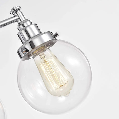 Close-up of globe glass on Four Light Chrome Bath Vanity Fixture With Globe Glass Uplight And Downlight 30 Inch Wide Hardwired