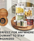 12 Inch Acacia Wood Lazy Susan Turntable With Double Handle, Big Spice Organizer holding jars on a countertop in kitchen setting