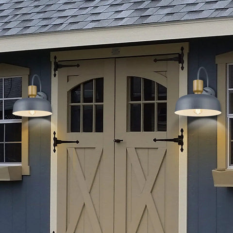 Outdoor Barn Light Gooseneck With Hammered Metal Shade In Gold Farmhouse Exterior Wall Mount Sconce displayed on shed