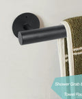One Foot Matte Black Indoor Stair Railing And Short Metal Handrail Built Tough As Nails With Heavy Steel Pipe And Galvanized Brackets mounted on wall, holding towel.