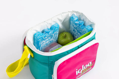 Maxcold Ice Block Four Pack Reusable Freezable Gel Cooling Blocks in lunch bag with apple and container