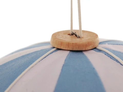 Close-up of Handmade Hanging Hot Air Balloon Nursery Decor In Baby Blue For Kids Room Large 12 Inch Textile Ornament attachment point.