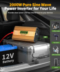 Power Up Anywhere With A 2000 Watt Pure Sine Wave Inverter That Turns 12V DC Into 110V 120V AC For Truck RV Home Solar And Off Grid Use With 4000W Surge Dual AC Outlets 5V 3.4A USB Digital Display Remote Control in car trunk with luggage and battery