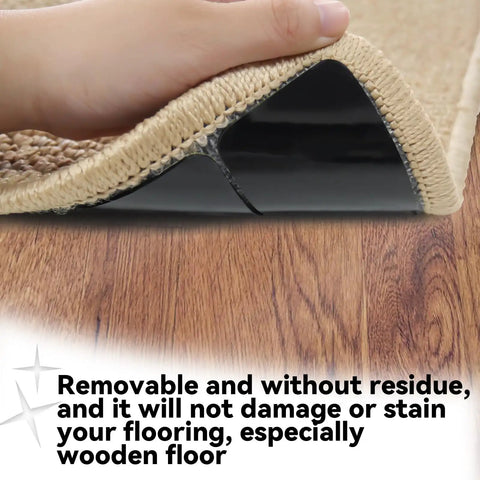 Non Slip Rug Grippers Set For Area Rugs showing rug tape pad on corner of a rug over hardwood floor, demonstrating removal