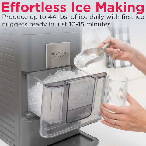 Compact Countertop Nugget Ice Maker Making 44 Pounds Daily In Just Ten Minutes with ice scoop and glass.