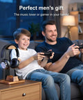 Walnut Wood Headset Stand with Built In Controller Holder and Storage Base for your Desk, in a living room with gaming setup