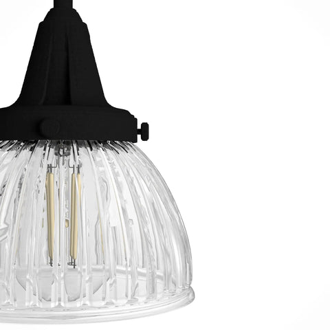 Close-up of clear holophane glass shade on Cypress Grove 4 Light Natural Black Iron Vanity Light With Clear Holophane Glass Shade, Medium Size