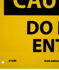 OSHA Caution Do Not Enter Sign 10 Inch By 7 Inch Rigid Plastic Black On Yellow Indoor Outdoor Weatherproof And Chemical Resistant Worksite Must Have Safety Sign That Keeps Everyone In Check close-up corner view