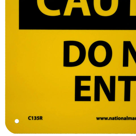 OSHA Caution Do Not Enter Sign 10 Inch By 7 Inch Rigid Plastic Black On Yellow Indoor Outdoor Weatherproof And Chemical Resistant Worksite Must Have Safety Sign That Keeps Everyone In Check close-up corner view