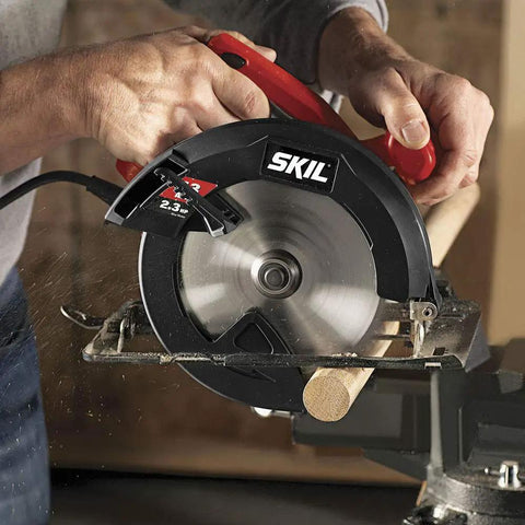 Heavy Hitter 13 Amp 7 1/4 Inch Corded Circular Saw In Bright Red cutting wood with precise, smooth rip cuts in workshop.