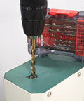 Left Hand Drill Bit Set 15 Pcs M35 Cobalt For Removing Broken Stubs Bolts And Screws Reverse Twist Bits in use on metal