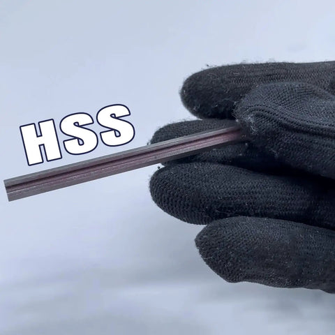 Gloved hand holding HSS planer blade from 3-1/4 Inch Planer Blades Set - 10 High Speed Steel Knife Blades, 82 mm X 5.5 mm X 1.2 Mm