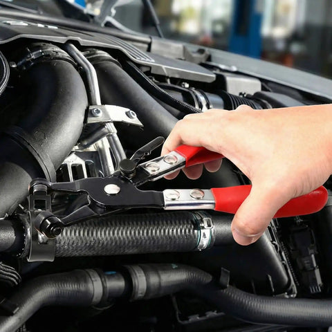 130 Piece Hose Clamp Set With 16 Sizes 6 To 25 mm Swivel Jaw Pliers in use on engine radiator hoses