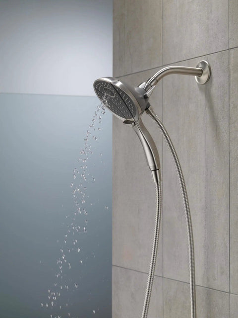 Two In One Dual Shower Head With Handheld Spray In Chrome, Detachable Shower Head With Hose on tiled bathroom wall spraying water