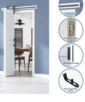 DIY Ready Space Saving Bi-Fold Barn Door Kit With Sliding Hardware installed in doorway, showing embedded hinges and pull handle.