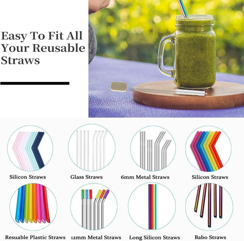 Glass of smoothie with colorful straw on table, assorted reusable straws displayed below.