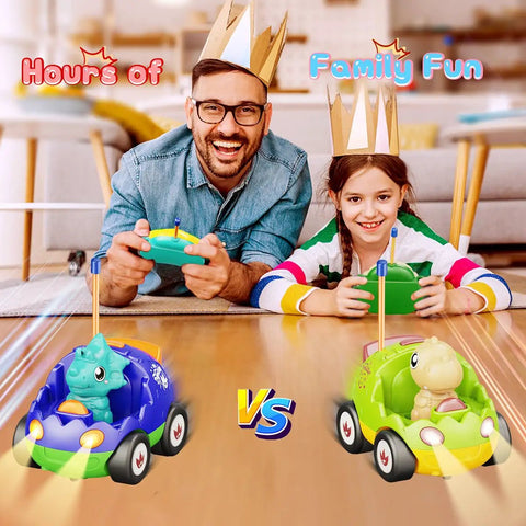 Two Pack Dinosaur Remote Control Cars For Toddlers Ages 2 To 5 being played with by a man and child, showcasing blue and green dino RC cars.