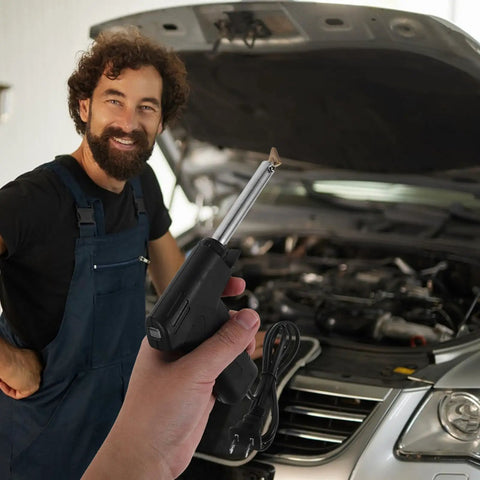 Portable welding bumper car kit tool in hand for auto repair; ergonomic design for fixing plastic and metal parts.
