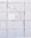 Image showing a Self Adhesive Wall Patch Kit with 12 Durable Vinyl Siding Patches fixing cracks on a concrete wall.