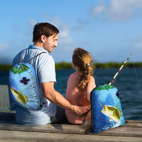 Father and daughter with 20 Pcs Fishing Party Favors Drawstring Backpacks 17 by 13.4 Inches by a lake