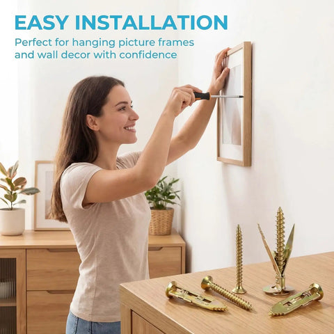 Woman using All In One 420 Piece Drywall Anchors Kit With Self Drilling Metal Plugs Holds Up To 80 Lb for picture hanging