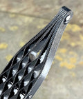 Close-up of Japanese rasp and sanding block showing non clogging teeth, detail of quick swap blades design.