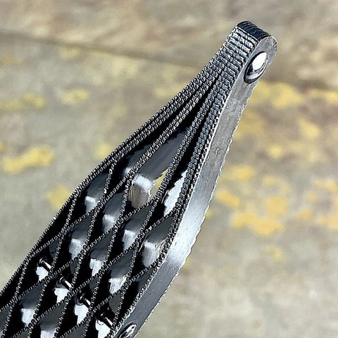 Close-up of Japanese rasp and sanding block showing non clogging teeth, detail of quick swap blades design.